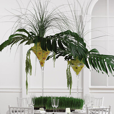 Gerbera and Monstera Elevated Centerpiece